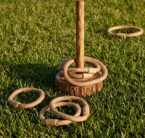 Rustic wooden ring toss quoits game on grass